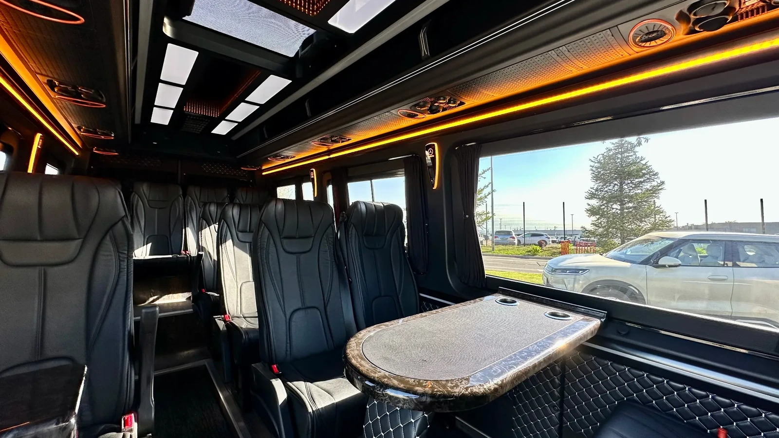 VIP-салон чёрного Sprinter на 17 мест с индивидуальной подсветкой и столиком в Астане
